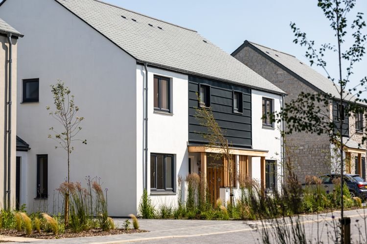 A modern new home in Crantock Cornwall with a wooden porch.