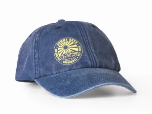 A studio shot of a blue baseball cap on a white background.